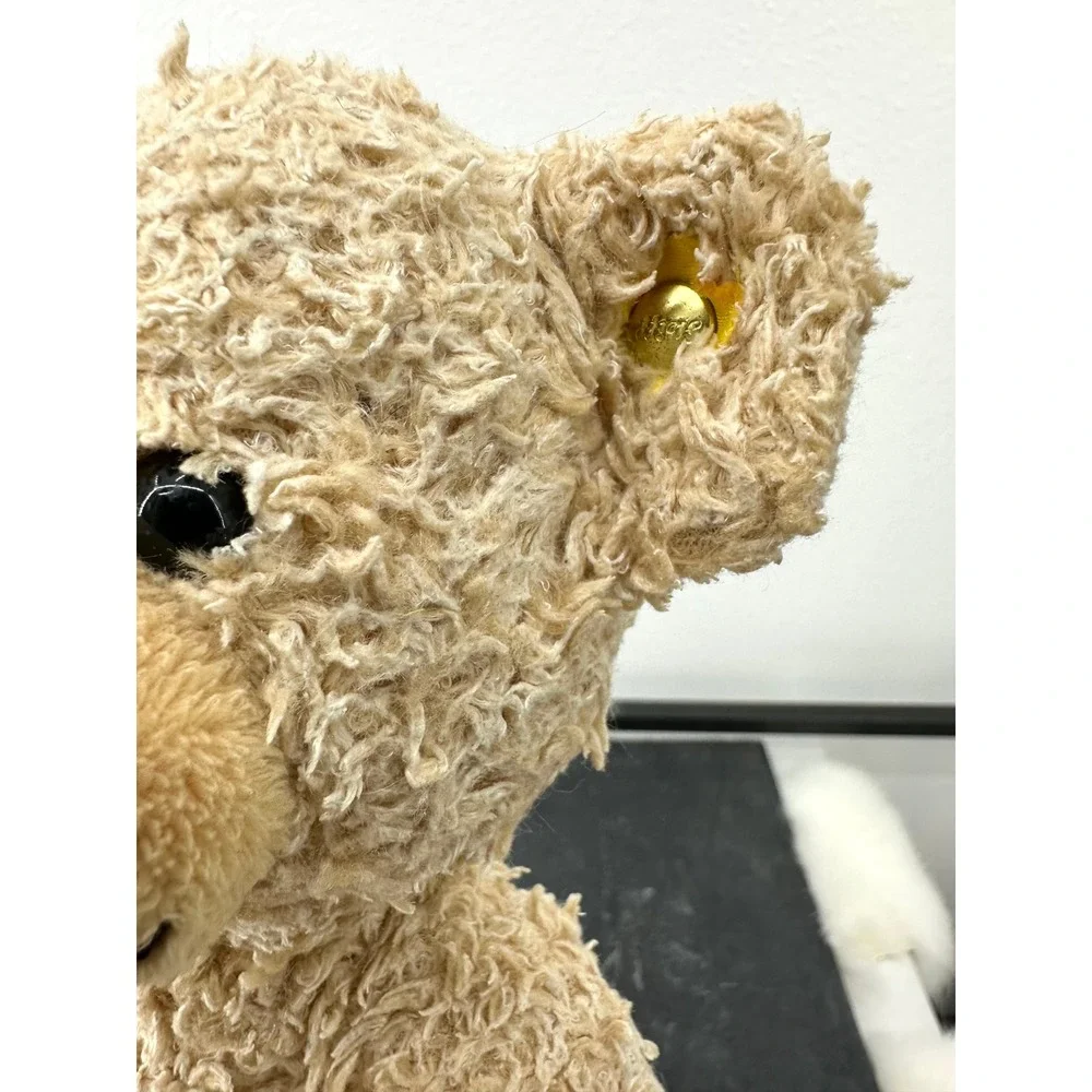 Small Steiff Fynn blonde stuffed teddy bear textured plush